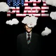 Plakat mit dem Schriftzug „HAPPY PLACE“ in US-Flaggen-Optik, umgeben von Wolken. Eine Person im Anzug lächelt, ihr Gesicht teilweise von einer Wolke verdeckt.
